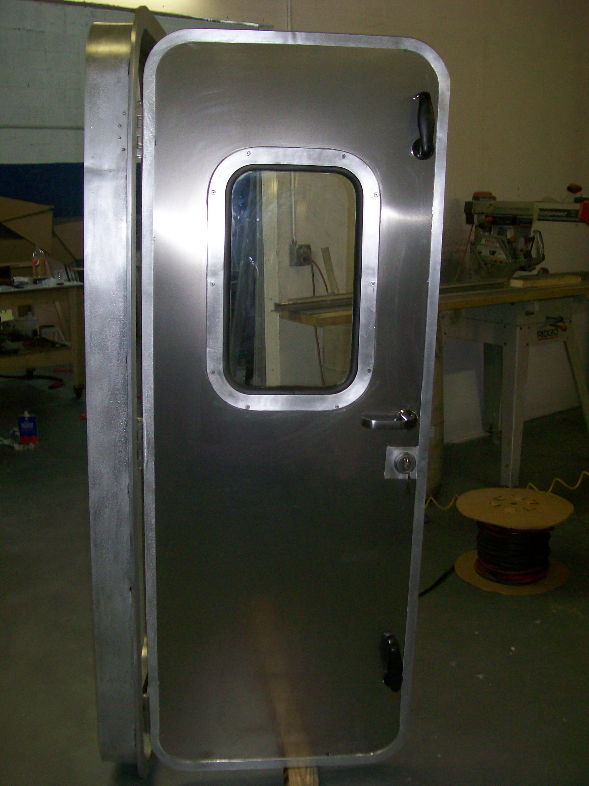 MARINE ALUMINUM WEATHER TIGHT DOORS UNLIMITED MARINE MFG INC 3054206034